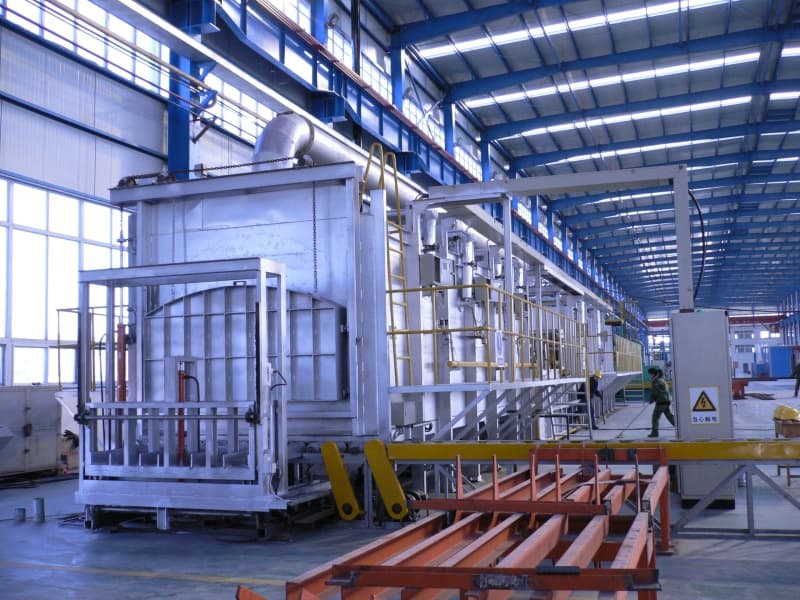 Stepped quenching and tempering production line with waste heat recovery system